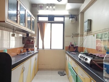 Kitchen in 2 BHK Apartment at Lodha Paradise, Majiwada – for Rent