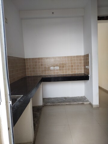 Kitchen in 2 BHK Apartment at Mahagun Mywoods, Sector 16c Greater Noida – for Rent