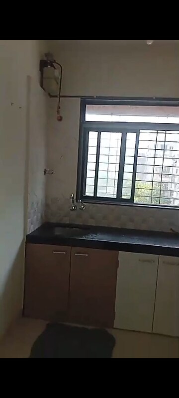 Kitchen in 2 BHK Apartment at Kabra Nandanwadi, Goregaon West – for Rent