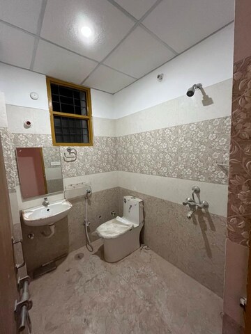 Bathroom in 3 BHK Apartment at Mahanagar – for Rent