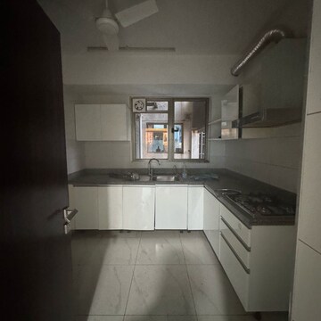 Kitchen in 4 BHK Apartment at Tata Primanti-Tower Residences, Dhani – for Sale