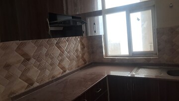 Kitchen in 2.5 BHK Apartment at Amrapali Leisure Park, Amrapali Leisure Valley – for Sale