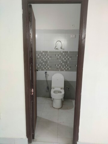 Bathroom in 3 BHK Apartment at Gulmohur Garden, Raj Nagar Extension – for Rent