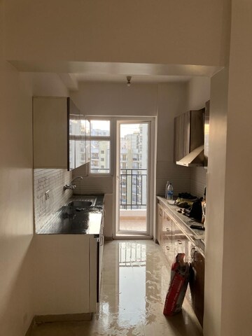 Kitchen in 3 BHK Apartment at Nirala Estate, Tech Zone 4 Greater Noida – for Rent