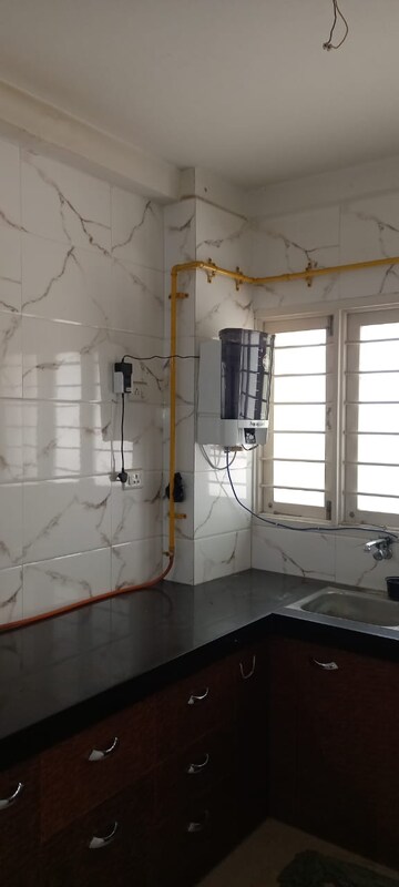 Kitchen in 1.5 BHK Apartment at Navarangpura – for Rent
