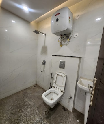 Bathroom in 3 BHK Builder Floor at Freedom Fighters Enclave – for Rent