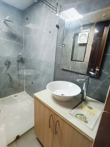 Bathroom in 3 BHK Builder Floor at Ansal API Esencia, Sector 67 – for Rent