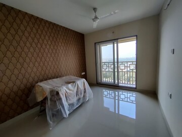 Bedroom in 2 BHK Apartment at Paradise Lifespaces Sai World City, New Panvel – for Rent