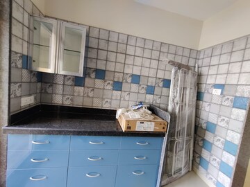 Kitchen in 2 BHK Apartment at Paradise Lifespaces Sai World City, New Panvel – for Rent