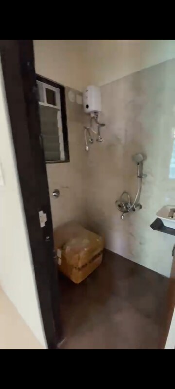 Bathroom in 1 BHK Apartment at Hirani Om Sukhkarta Heights, Vikhroli East – for Rent