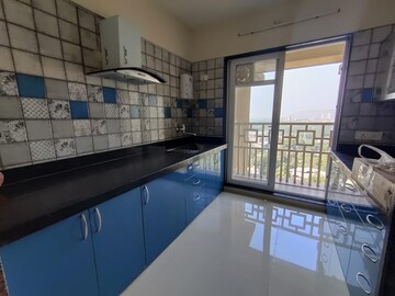 Kitchen in 2 BHK Apartment at Paradise Sai World City Phase 2, New Panvel – for Rent