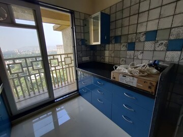 Kitchen in 2 BHK Apartment at Paradise Sai World City Phase 2, New Panvel – for Rent