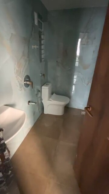 Bathroom in 1 BHK Apartment at Pramanik Walchand Paradise, Mira Road – for Rent