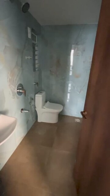 Bathroom in 1 BHK Apartment at Pramanik Walchand Paradise, Mira Road – for Rent