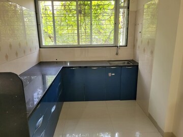 Kitchen in 2 BHK Apartment at Kumar Vastu, Bhosle Nagar – for Rent