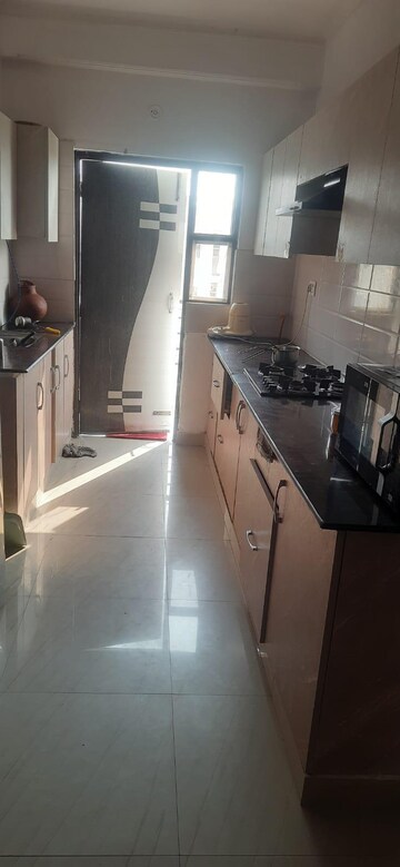 Kitchen in 2 BHK Apartment at Sangwan Heights, Raj Nagar Extension – for Rent