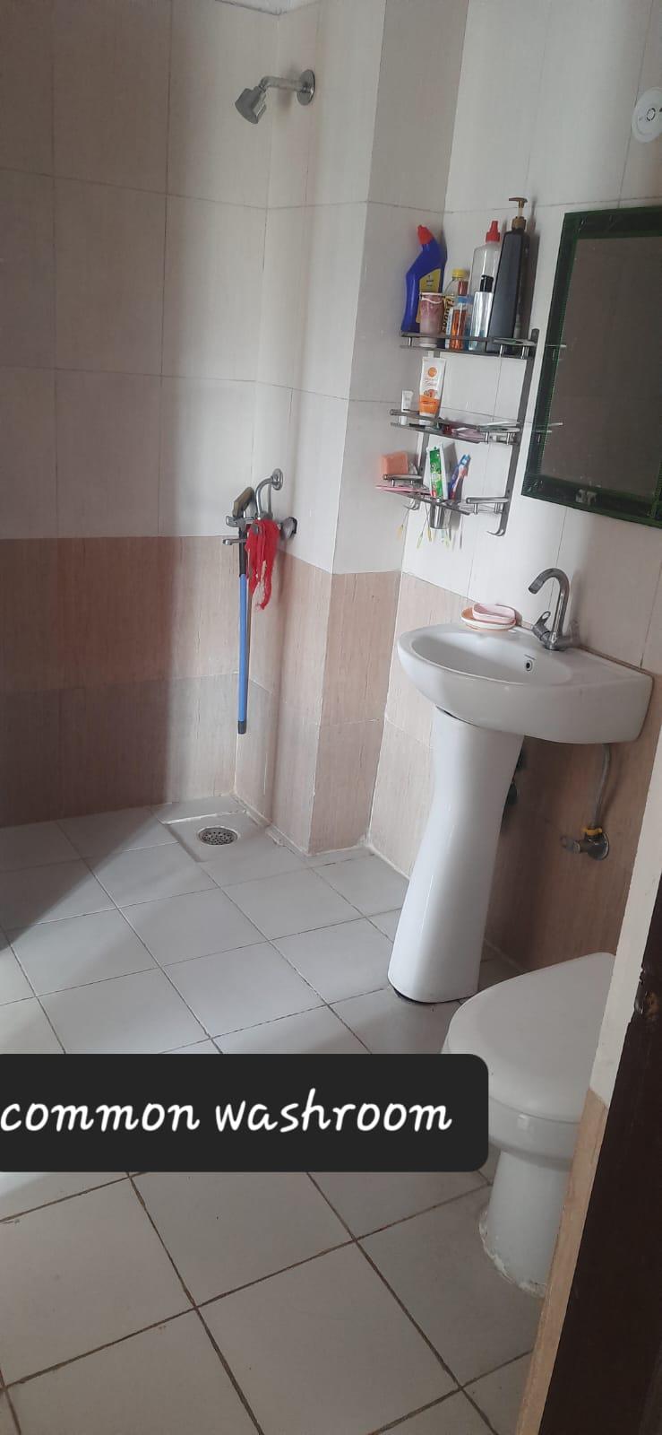 Bathroom in 2 BHK Apartment at Sangwan Heights, Raj Nagar Extension – for Rent
