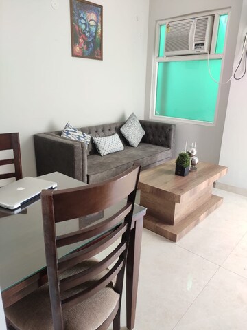 Living Room in 1 BHK Apartment at Ansal Sushant Lok I, Sector 43 – for Rent