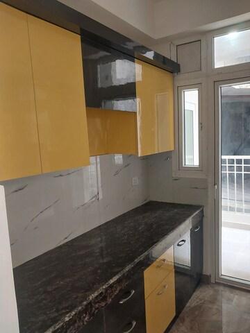 Kitchen in 3 BHK Apartment at Migsun Roof, Raj Nagar Extension – for Sale