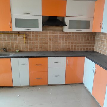 Kitchen in 2 BHK Apartment at Amrapali Golf Homes, Sector 4 Greater Noida – for Rent