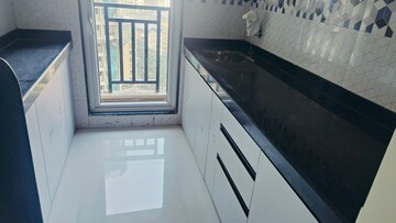 Kitchen in 1 BHK Apartment at Raunak Bliss B1, Ghodbunder Road – for Rent