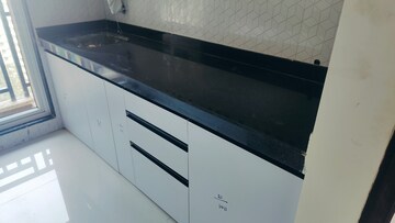Kitchen in 1 BHK Apartment at Raunak Bliss B2, Ghodbunder Road – for Rent
