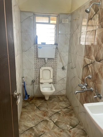 Bathroom in 1 BHK Apartment at Puraniks City Reserva, Ghodbunder Road – for Rent