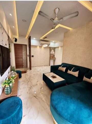 Living Room in 2 BHK Apartment at Rustomjee Urbania Azziano, Majiwada – for Rent