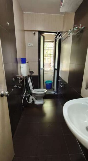 Bathroom in 4 BHK Apartment at Vidarbha Mahesh CHS, Kavesar – for Rent