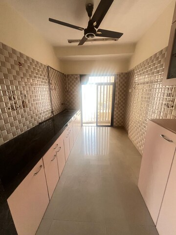 Kitchen in 2 BHK Apartment at Om Sai Charan CHS, Borivali West – for Rent