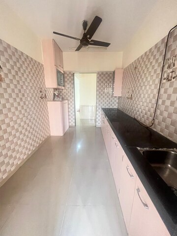 Kitchen in 2 BHK Apartment at Om Sai Charan CHS, Borivali West – for Rent