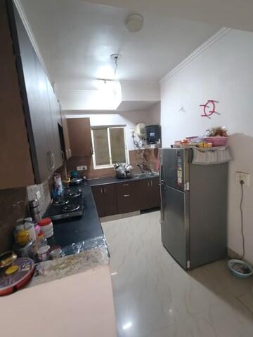 Kitchen in 4 BHK Apartment at Mahagun Mezzaria, Sector 78 – for Rent