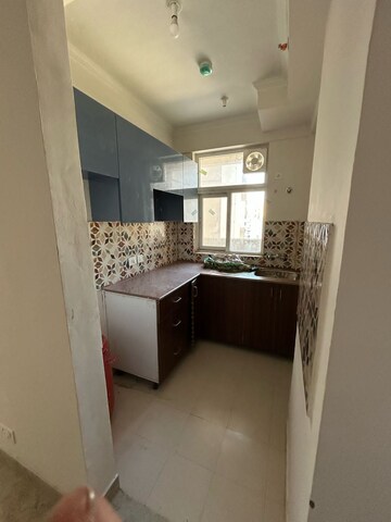 Kitchen in 2.5 BHK Apartment at Amrapali Riverview, Amrapali Leisure Valley – for Rent