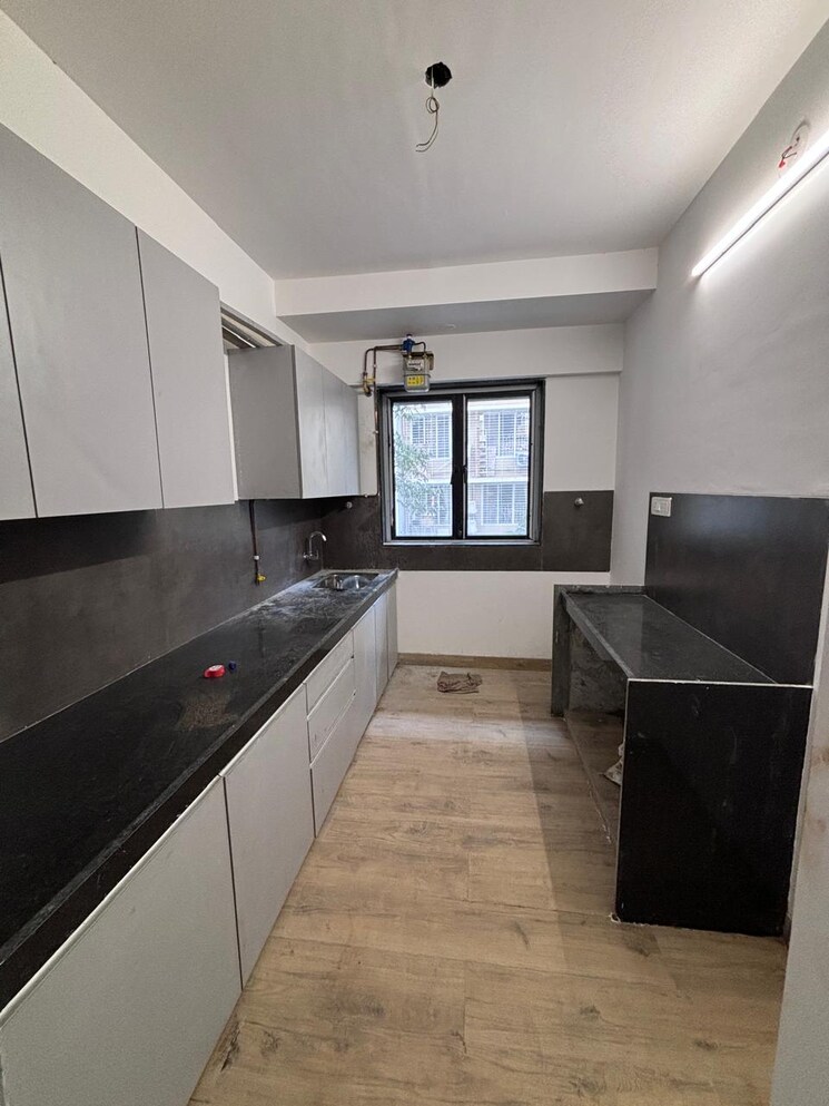 Kitchen, dev-leo-tower 2 Bedroom 670 Sq.Ft. Apartment In Oshiwara Mumbai 8307525