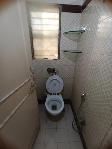 Bathroom in 1 BHK Apartment at RNA Regency Park, Kandivali West – for Rent
