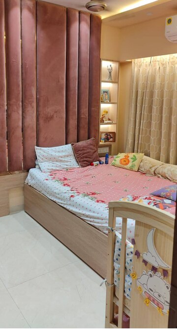 Bedroom in 1 BHK Apartment at Ruparel Elara, Kandivali West – for Rent
