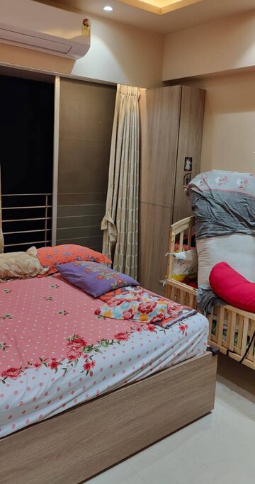 Bedroom in 1 BHK Apartment at Ruparel Elara, Kandivali West – for Rent