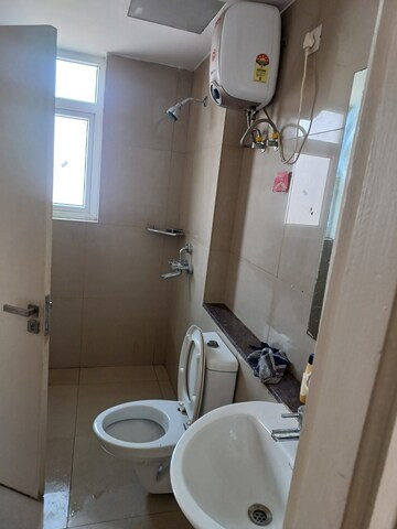 Bathroom in 3.5 BHK Apartment at Emaar Palm Gardens, Sector 83 – for Sale