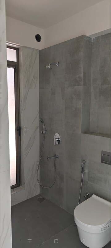 Bathroom in 4 BHK Apartment at Rajesh Raj Infinia, Malad West – for Rent