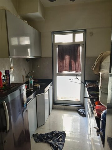 Kitchen in 1 BHK Apartment at JP North Atria, Mira Road – for Rent