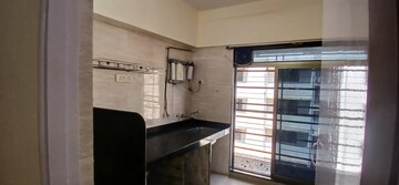 Kitchen in 1 BHK Apartment at Nilgiri Tower Agripada, Agripada – for Rent