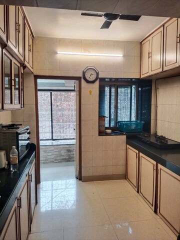 Kitchen in 2 BHK Apartment at Best View, Goregaon East – for Rent