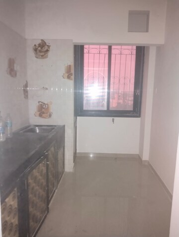 Room in 1 BHK Apartment at Sargam CHS Kamothe, Kamothe – for Rent