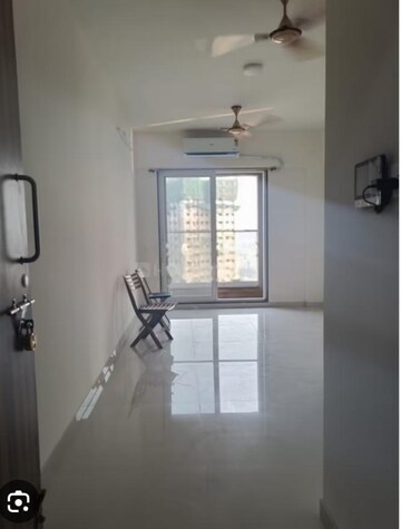 Living Room in 1 BHK Apartment at Ashar Axis, Majiwada – for Rent