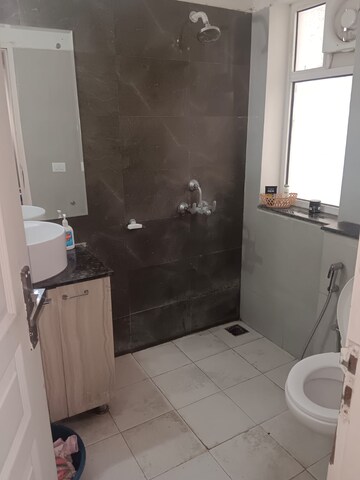 Bathroom in 3 BHK Apartment at International Airport Road – for Rent