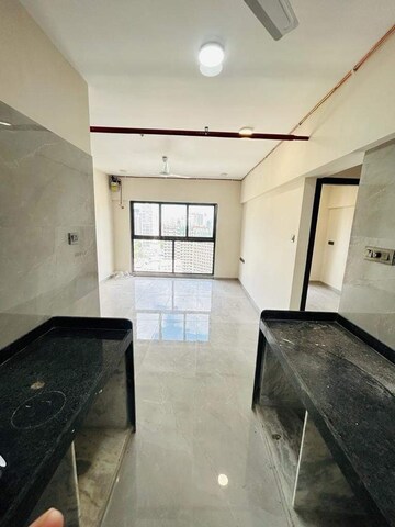 Kitchen in 2 BHK Apartment at Paradigm El Signora, Jogeshwari West – for Rent