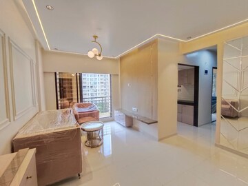 Living Room in 2 BHK Apartment at Rustomjee Global City – for Sale