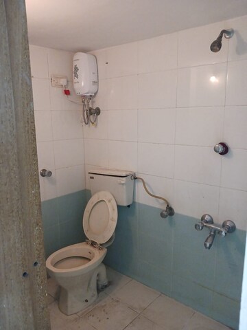 Bathroom in 2 BHK Apartment at Shanti Gardens , Mira Road – for Rent