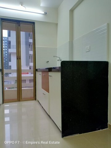 Kitchen in 2 BHK Apartment at Rustomjee Global City – for Sale