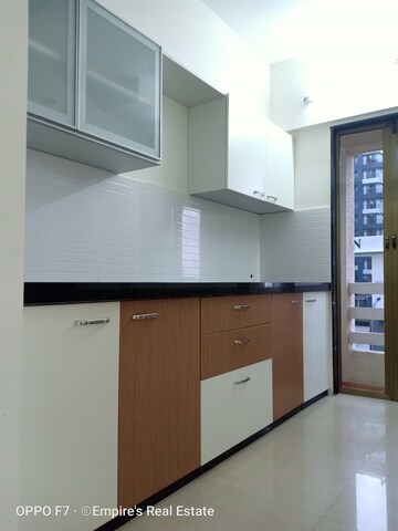 Kitchen in 2 BHK Apartment at Rustomjee Global City – for Sale